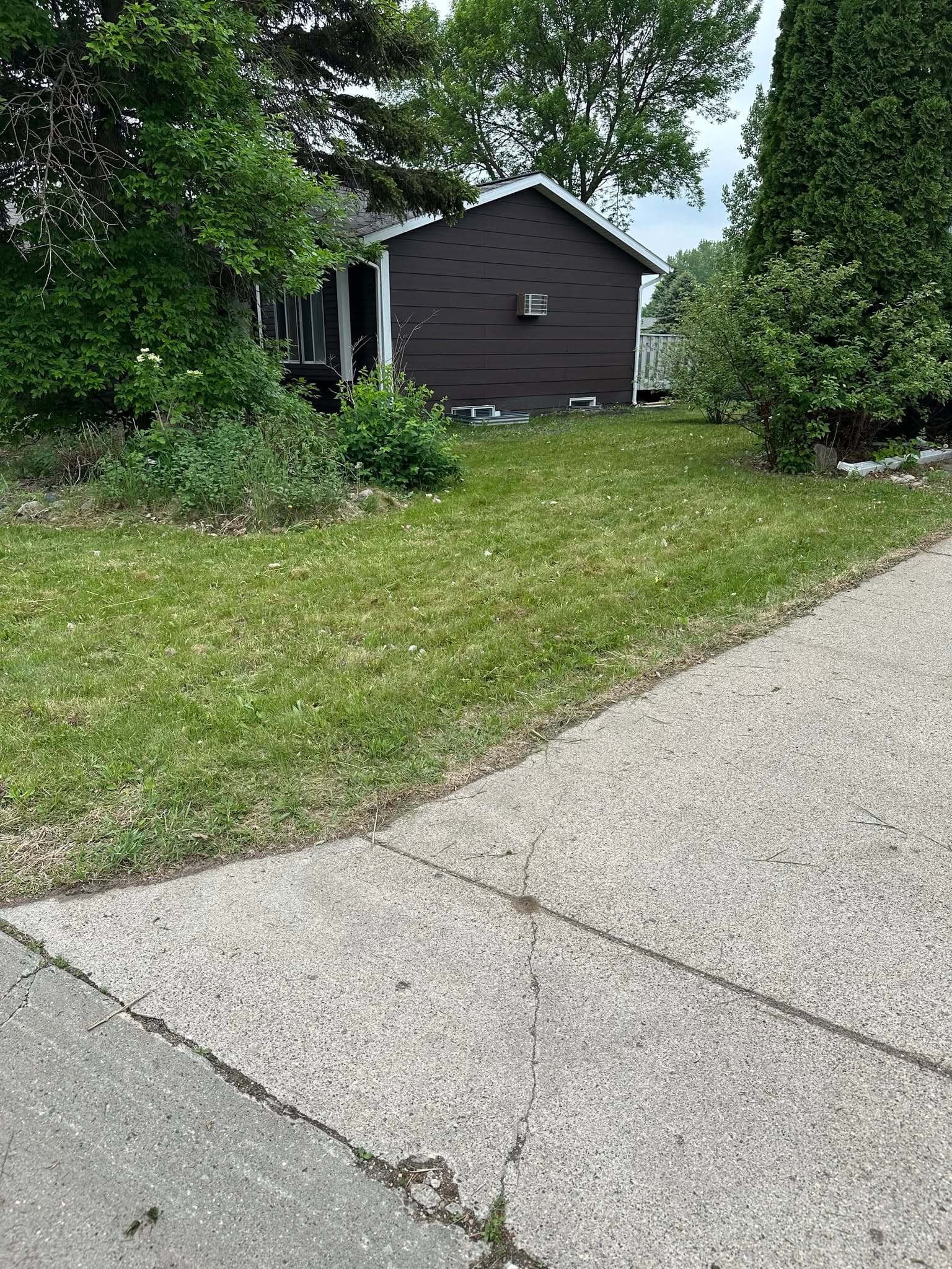 Mowed lawn with clean stripes — Fargo-Moorhead area