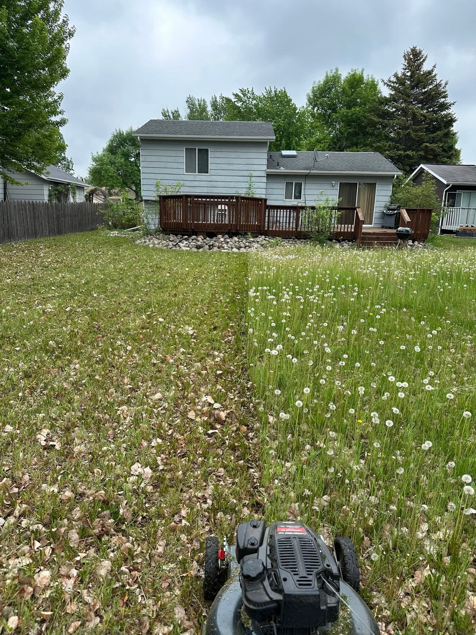 Lawn mowing service — Dynamite Lawn & Snow